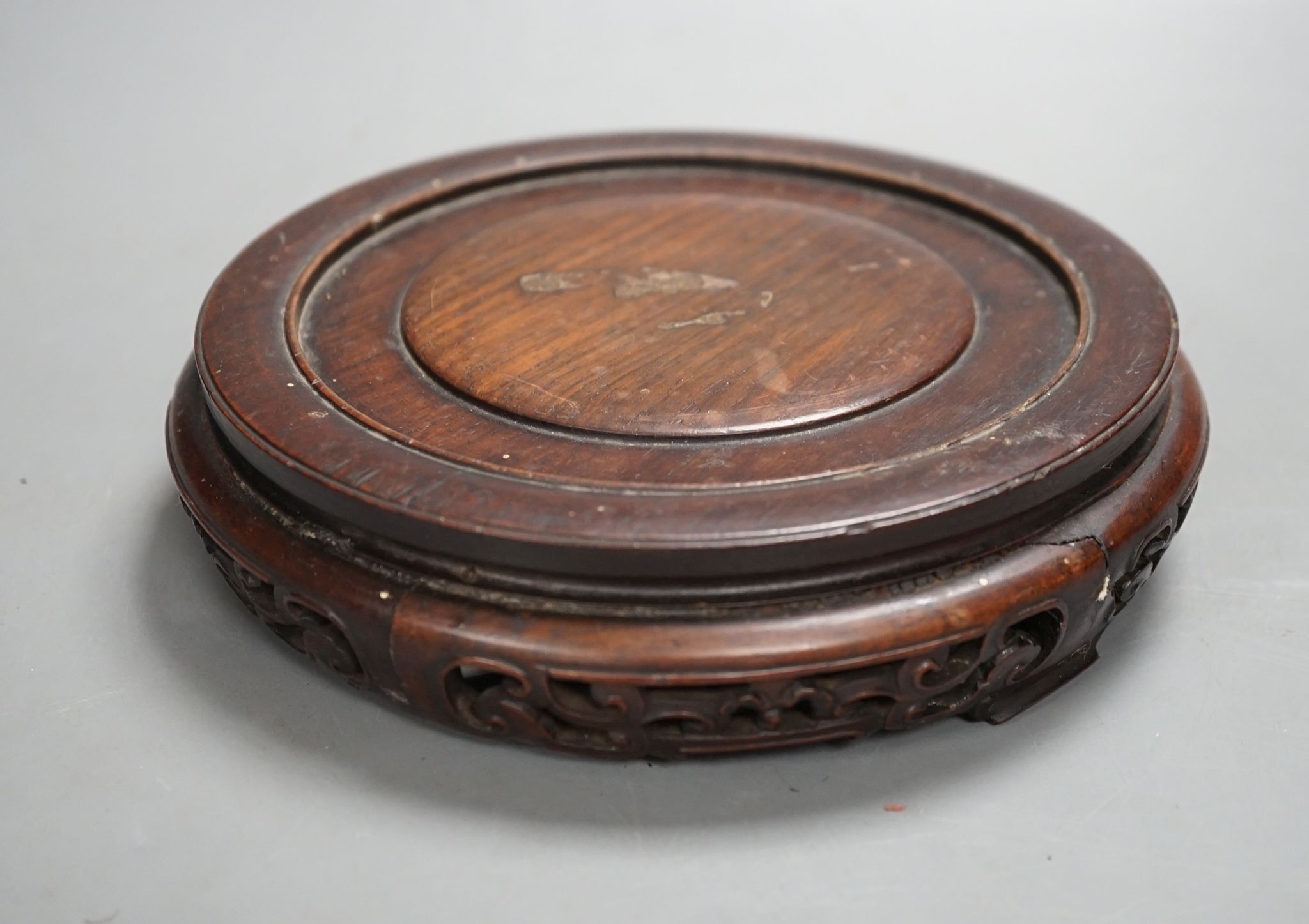 A Chinese carved hardwood stand 19cm